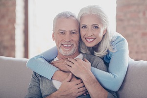 older couple smiling at camera